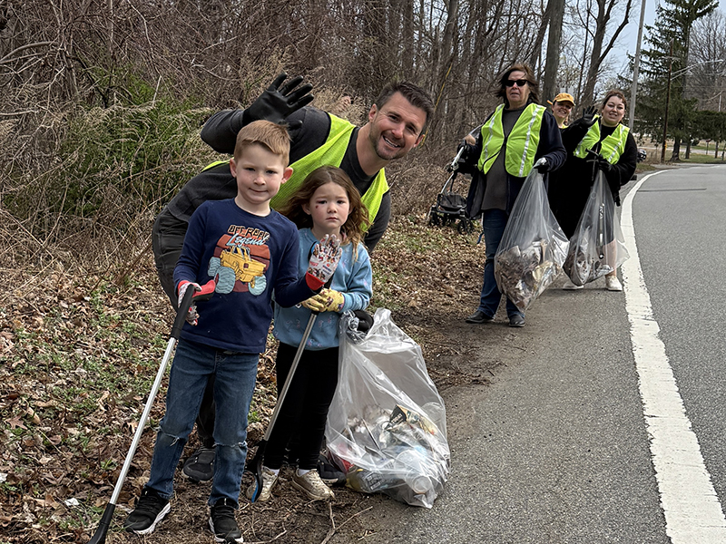 People volunteer at the 2025 Adopt-a-Spot cleanup