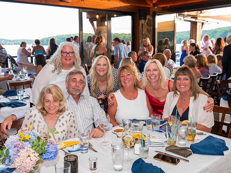 A group of people smile for a photo at the 2024 Lake Hopatcong Foundation Gala